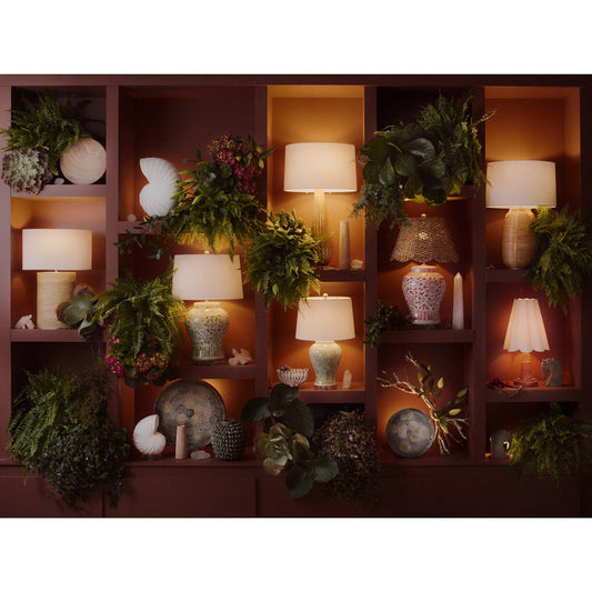 Nautilus Shell by Regina Andrew in white and white. Made from resin in a unique style.