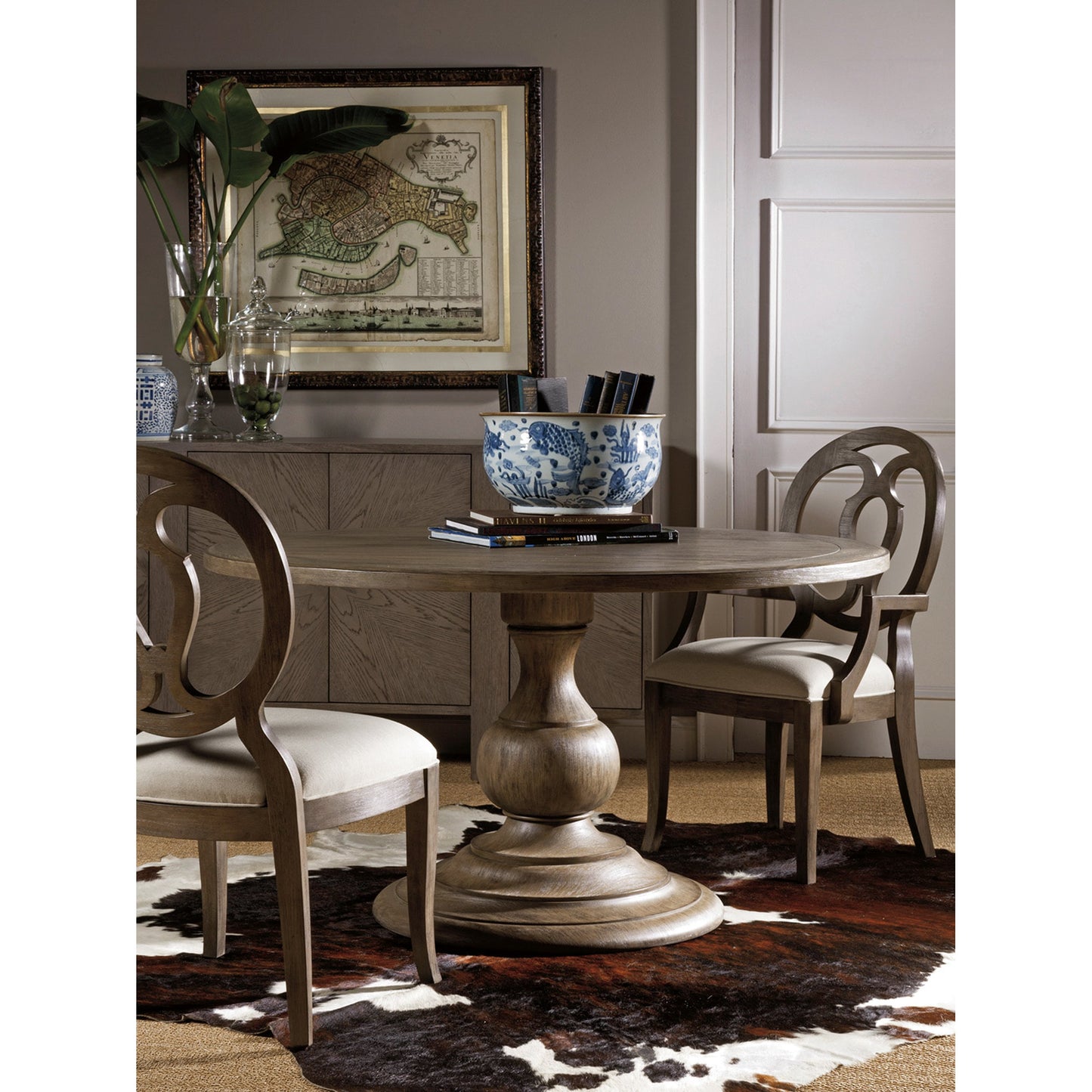 004 SR-834190 | Lifestyle | Axiom Round Dining Table by Artistica Home in grigio. Made from unique in a cottage & farmhouse style.