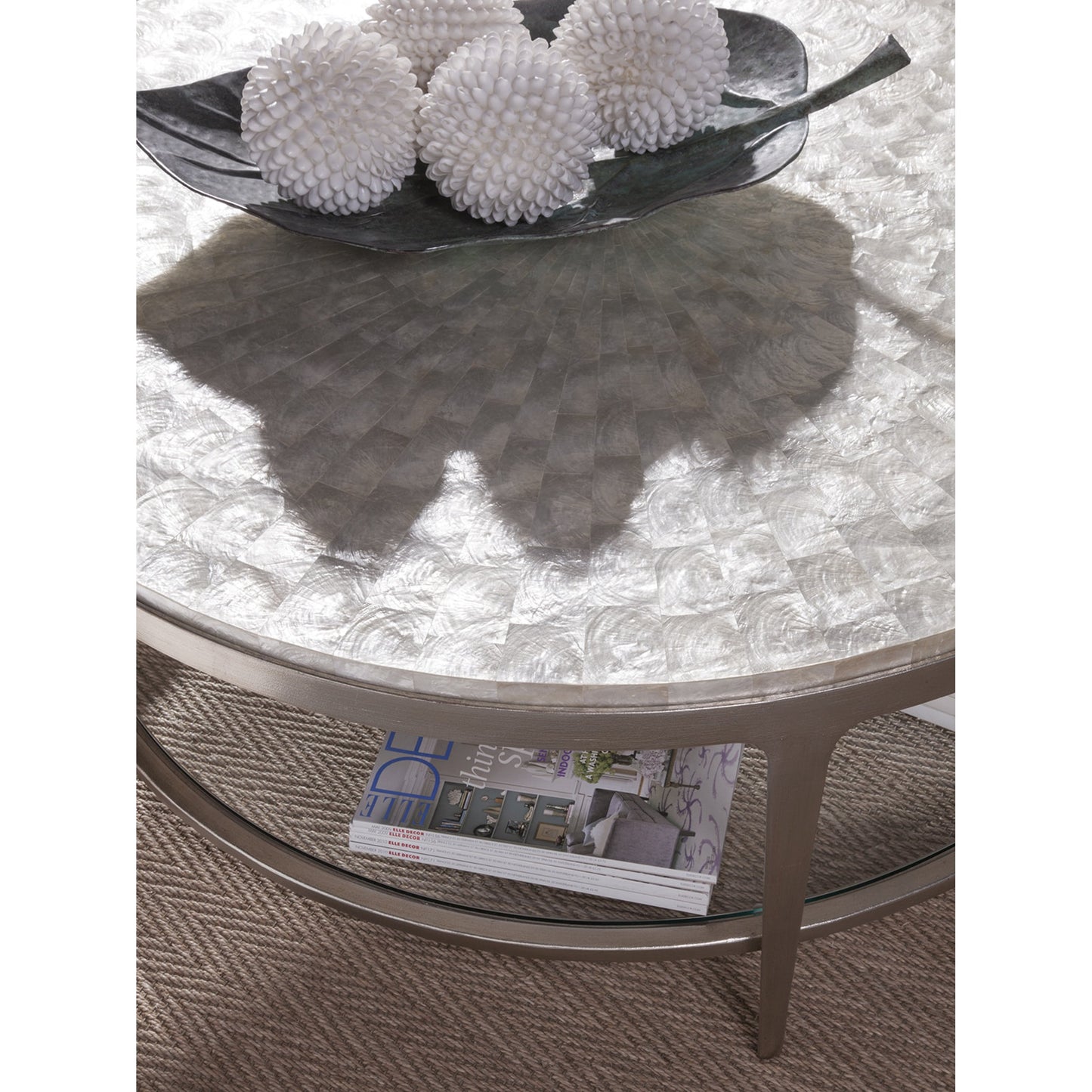 003 SR-834346 | Lifestyle | Gravitas Cocktail Table by Artistica Home in champagne foil. Made from unique in a modern style.