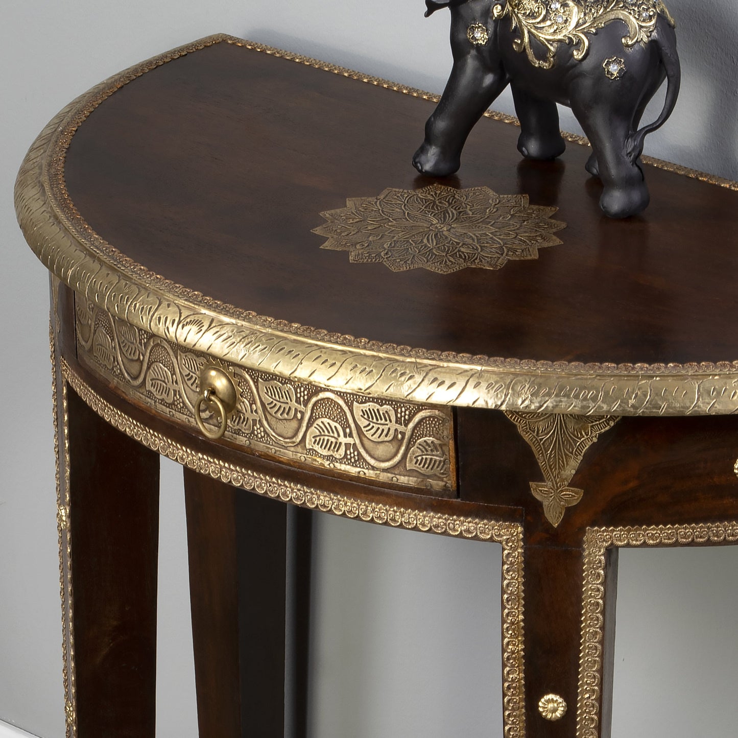 007 O-BUTLER-2054290 | Additional Silo | Ranthore Demilune Console Table by Butler Specialty Company in dark brown and artifacts. Made from mango wood solids, brass foil in a traditional style.