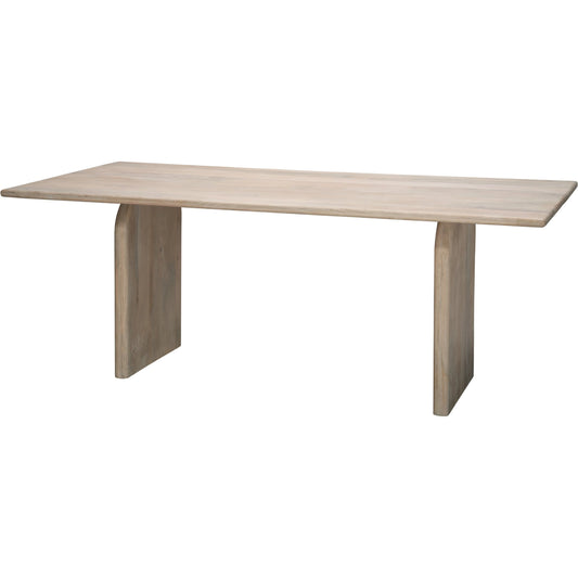 Arc Dining Table by Jamie Young. Made from mango wood in a modern style.