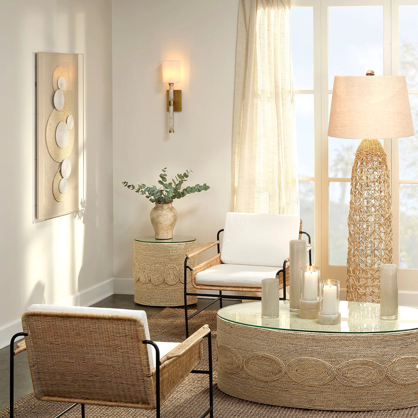 006 SR-912939 | Lifestyle | Barbados Oval Side Table by Jamie Young in off-white. Made from corn straw rope with tempered glass in a coastal style.