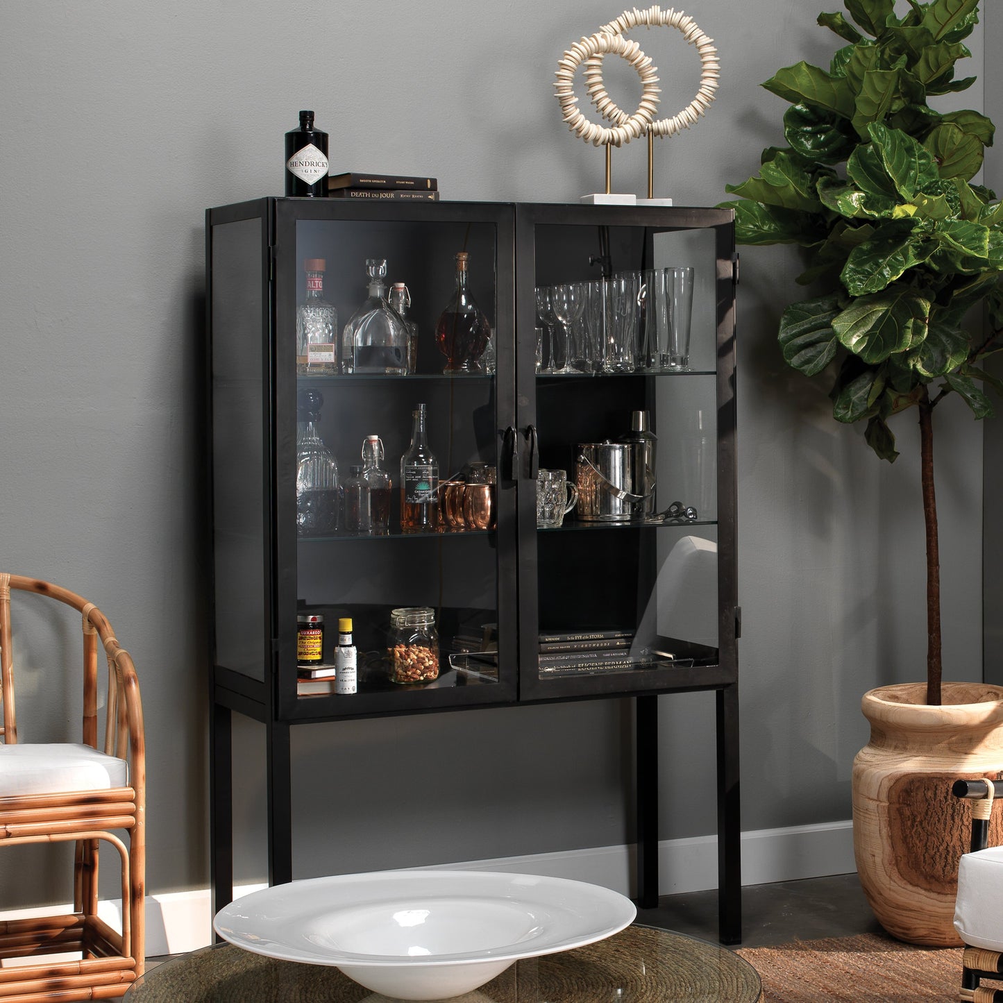 008 SR-707857 | Lifestyle | Chauncey Curio Bar Cabinet by Jamie Young in black iron, clear glass. Made from iron, glass in a modern style.