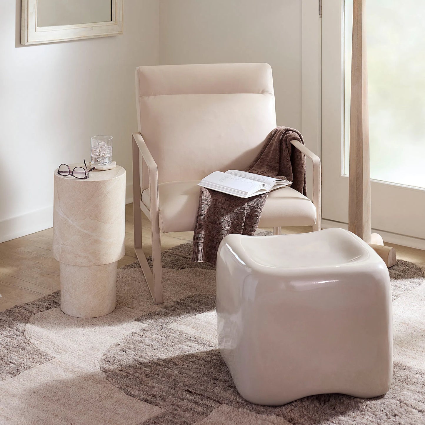 003 SI-2537696 | Lifestyle | Cushion Concrete Stool by Jamie Young. Made from concrete in a unique style.