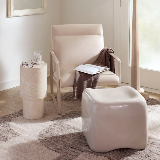 Cushion Concrete Stool by Jamie Young. Made from concrete in a unique style.
