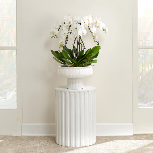 Fluted Column Side Table by Jamie Young in white. Made from cement in a modern style.