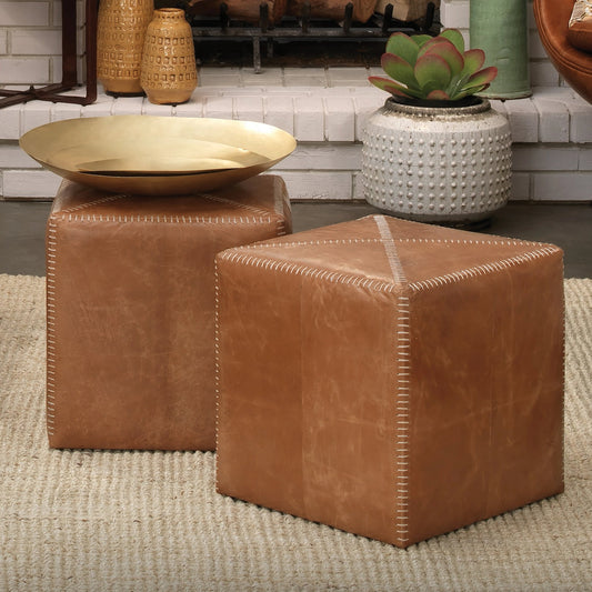 Small Ottoman by Jamie Young. Made from leather in a modern style.