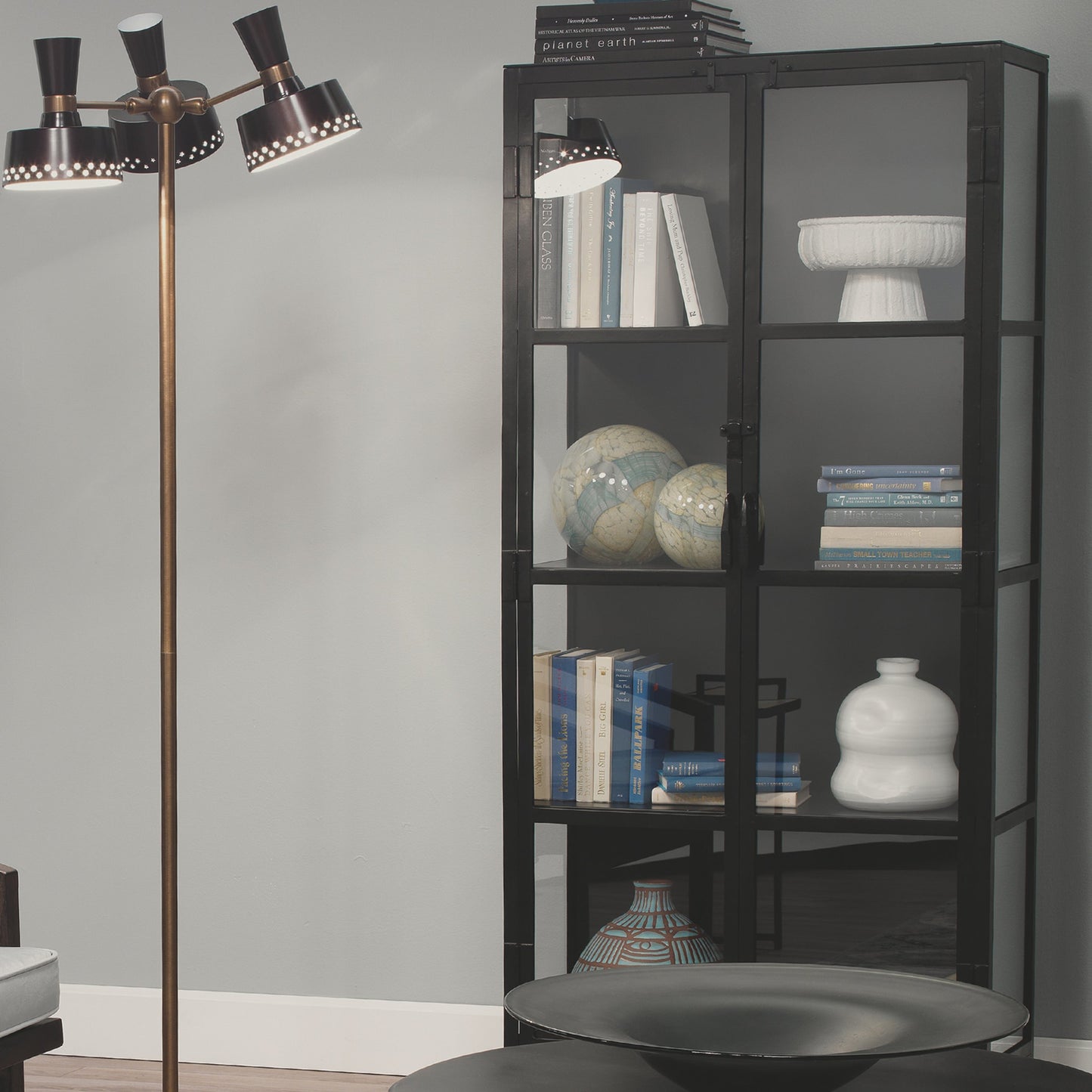 009 SR-708118 | Lifestyle | Union Curio Cabinet by Jamie Young in black iron, clear glass. Made from iron, glass in a modern style.