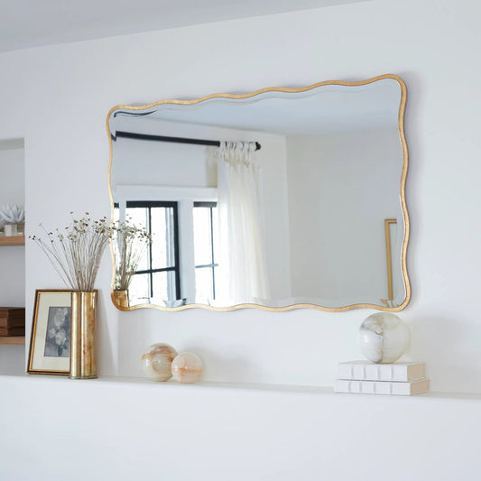 Candice Mirror by Regina Andrew in gold and gold leaf. Made from resin in a modern style.