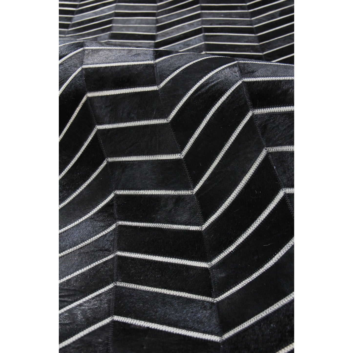 072 SI-1829088,SI-1829090 | Closeup | Natural Hide Rug by Exquisite Rugs. Made from leather hide in a unique style.