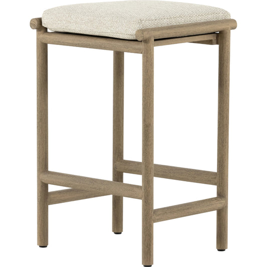 Kyla Outdoor Counter Stool by Four Hands in faye sand, washed brown. Made from 100% olefin, solid fsc®-certified teak, 91% polyurethane foam pad, 9% polyester fiber batting in a transitional style.