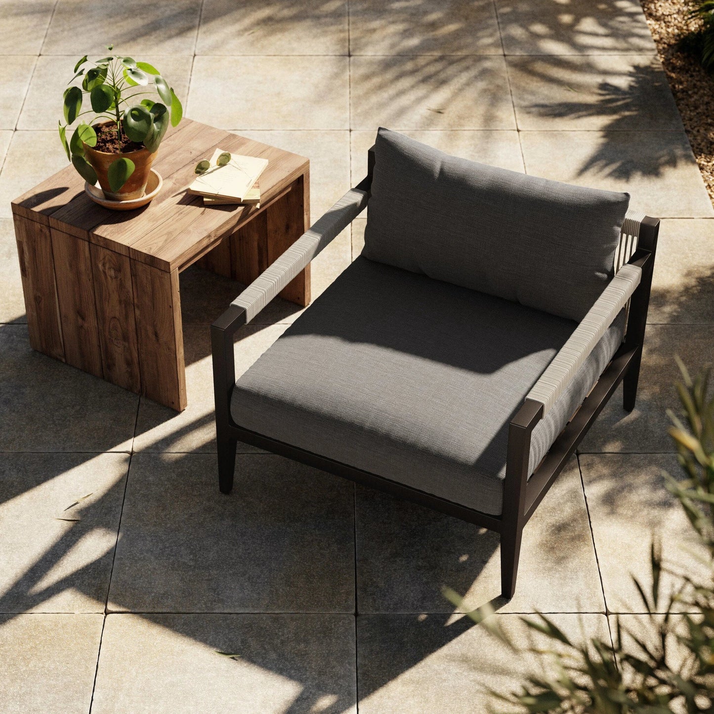 016 SI-1716712 | Lifestyle | Sherwood Outdoor Chair, Bronze by Four Hands in bronze. Made from 100% olefin, aluminum, 100% polypropylene in a modern style.