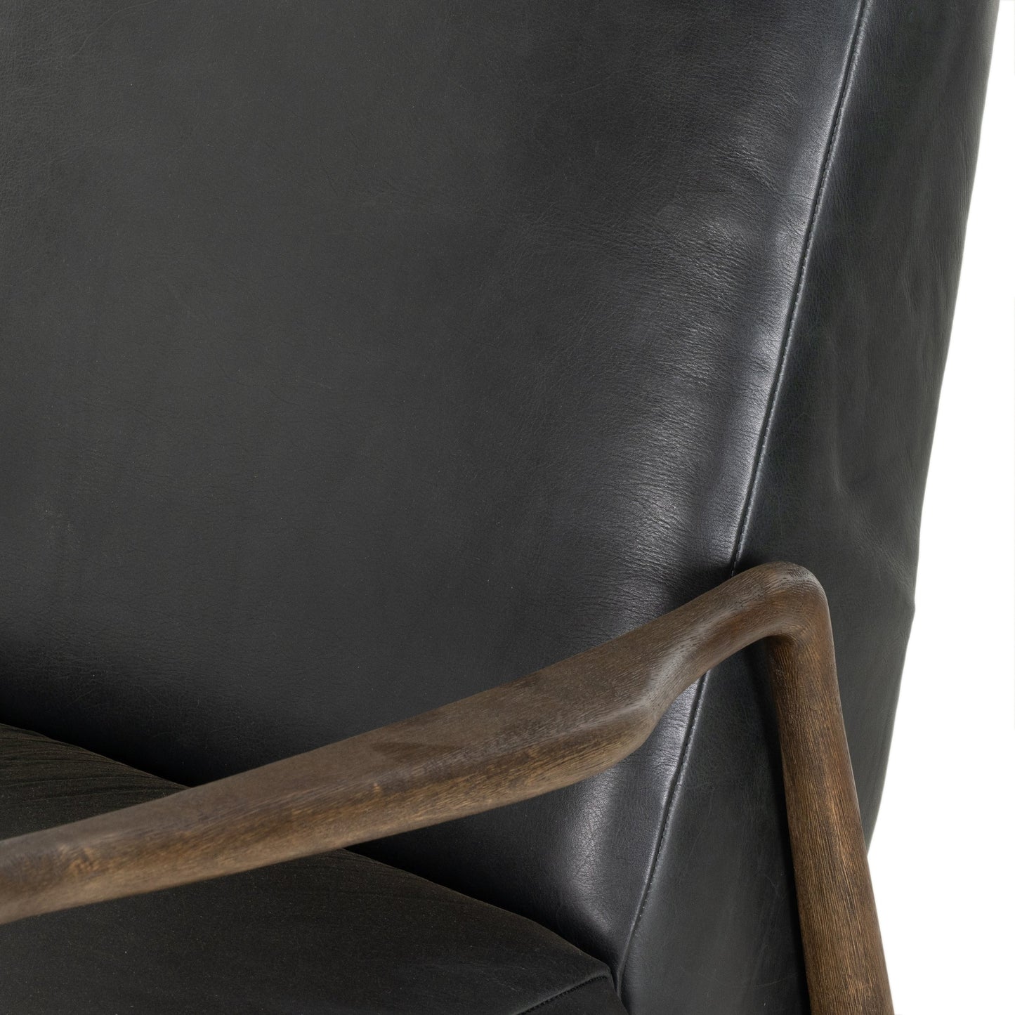 010 SI-1902132 | Additional Silo | Braden Recliner by Four Hands in dakota black, rubbed sienna brown. Made from top grain leather, solid parawood, 100% polyester in a modern style.