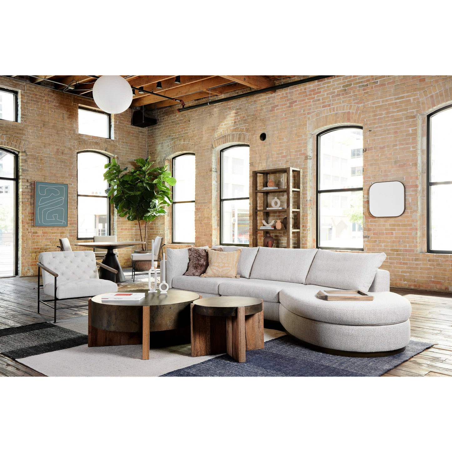 020 SI-1714454 | Lifestyle | Bingham End Table by Four Hands in rustic oak veneer, distressed iron and distressed iron. Made from thick oak veneer, engineered hardwood, iron in a rustic style.