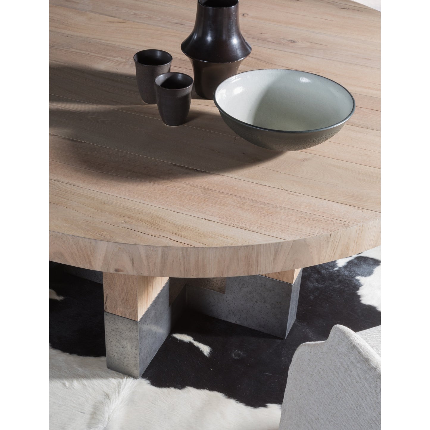 005 SI-1770644 | Lifestyle | Verite Round Dining Table by Artistica Home in natural, antiqued gun metal. Made from unique in a modern style.