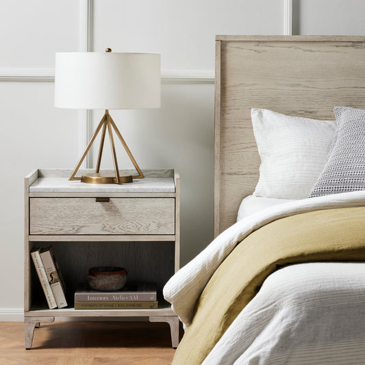 Viggo Nightstand by Four Hands in vintage white oak, bronze antimony, vintage white oak solid, italian white marble and vintage white oak, italian white marble. Made from oak veneer, solid oak, solid marble in a rustic style.