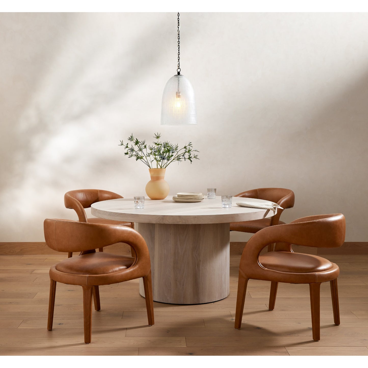 025 SI-1798176 | Lifestyle | Hudson Round Dining Table by Four Hands. Made from unique in a rustic style.