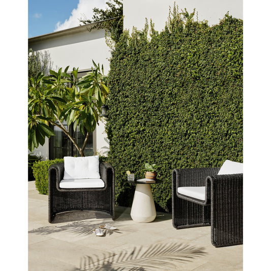 Tucson Woven Outdoor Chair by Four Hands. Made from 100% olefin, 100% polyethylene, iron in a coastal style.