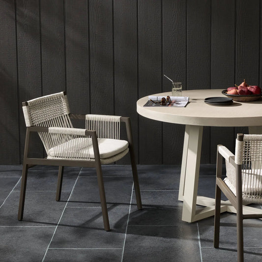 Shuman Outdoor Dining Chair by Four Hands in stone grey, bronze, heathered grey rope and stone gray. Made from 100% olefin, aluminum, 100% polypropylene in a modern style.