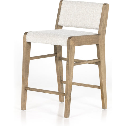 Charon Counter Stool by Four Hands in knoll natural and weathered drift. Made from 95% polyester, 5% acrylic, solid parawood, 100% polyester in a transitional style.