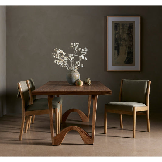 Hito Dining Chair by Four Hands in villa olive and burnished parawood. Made from 62% cotton, 20% flax, linen, 18% viscose (rayon), solid parawood, stainless steel in a transitional style.