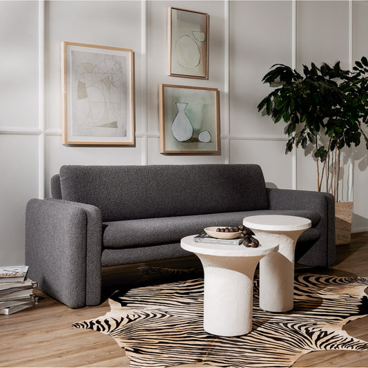Parra Low End Table by Four Hands in plaster molded concrete, white concrete and white. Made from concrete in a modern style.