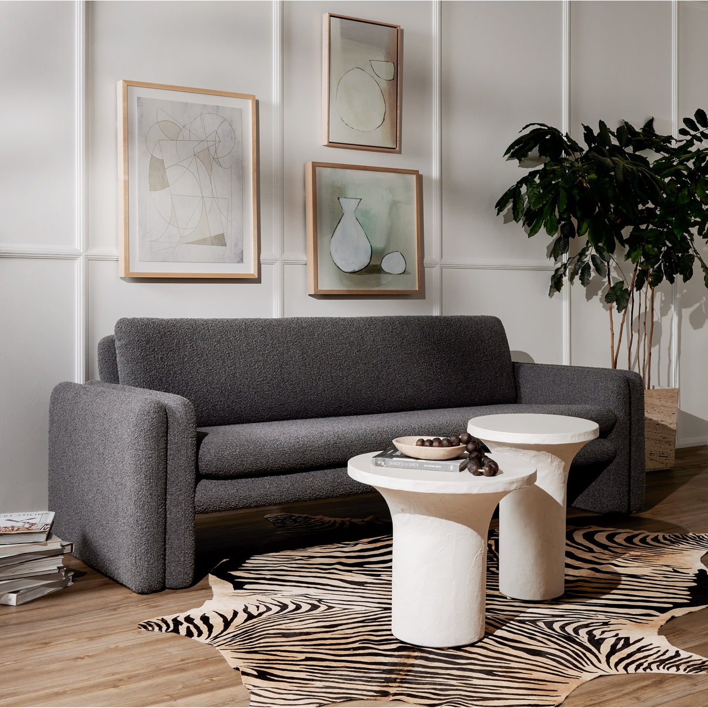 005 SI-1798332 | Lifestyle | Parra Low End Table by Four Hands in plaster molded concrete, white concrete and white. Made from concrete in a modern style.