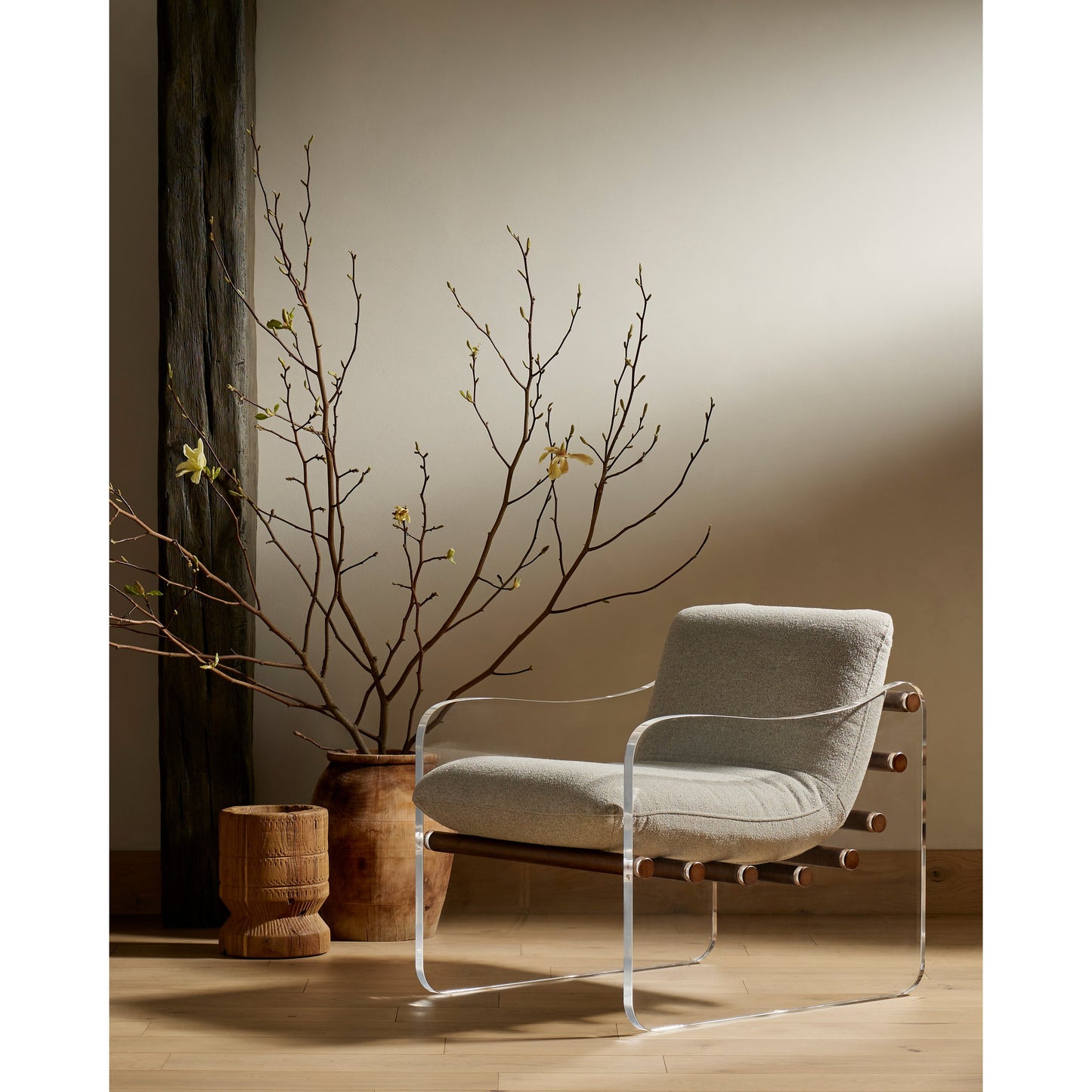 001 SI-1901674 | Lifestyle | Cassius Chair by Four Hands in torrance silver, almond, clear acrylic. Made from 100% recycled olefin, acrylic, solid parawood in a modern style.