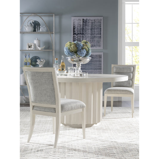 Sarto Round Dining Table by Artistica Home in cerused white grey. Made from unique in a transitional style.
