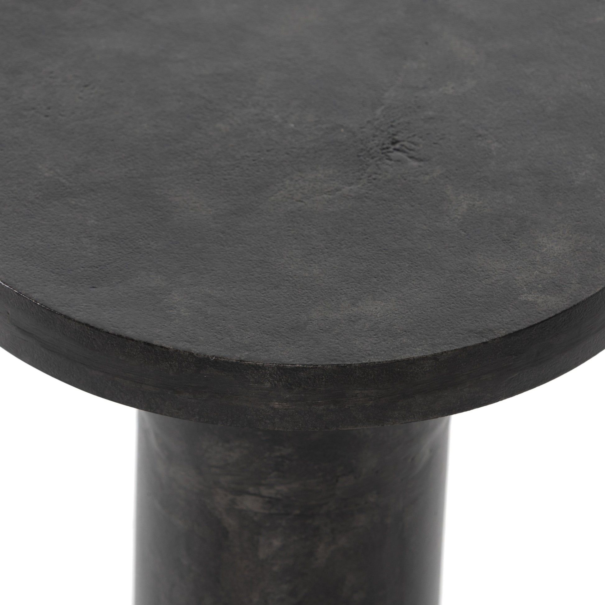 Gino End Table by Four Hands in raw black. Made from aluminum, engineered hardwood in a modern style.