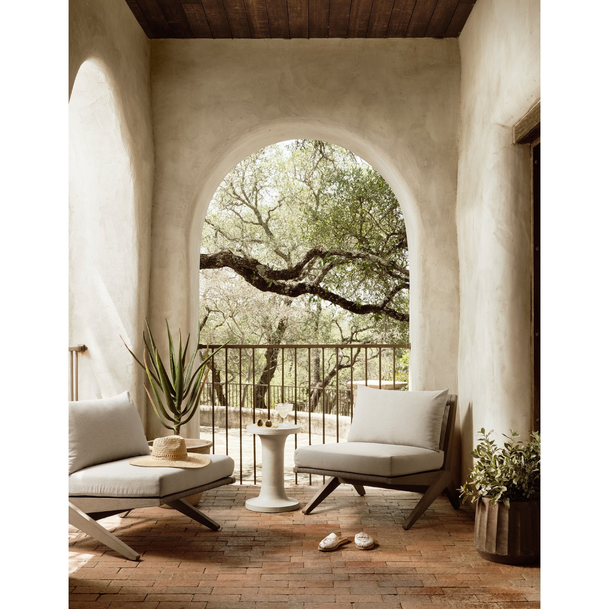 Gino End Table by Four Hands in raw black. Made from aluminum, engineered hardwood in a modern style.