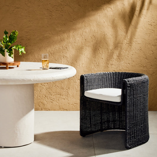 Tuscon Outdoor Dining Chair by Four Hands. Made from 100% olefin, 100% polyethylene, 90% polyurethane foam pad, 10% polyester fiber batting in a modern style.