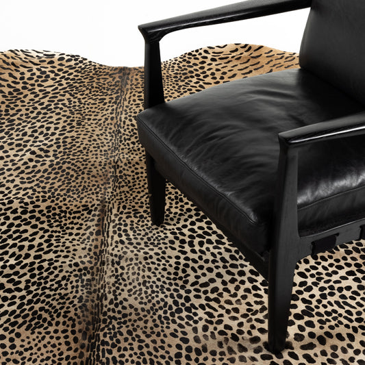 Leopard Hide Rug by Four Hands in leopard hair on hide. Made from hair on hide in a unique style.