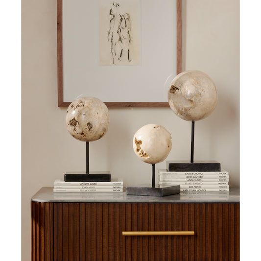 Organic Stone Sculptures, (Set of 3) by Four Hands in romano fosse travertine and black. Made from iron, solid travertine in a modern style.