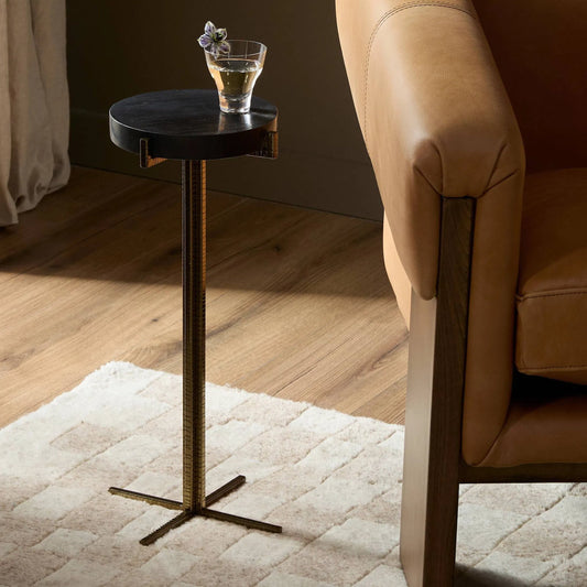 Jonty Round End Table by Four Hands. Made from petrified wood, stainless steel in a modern style.