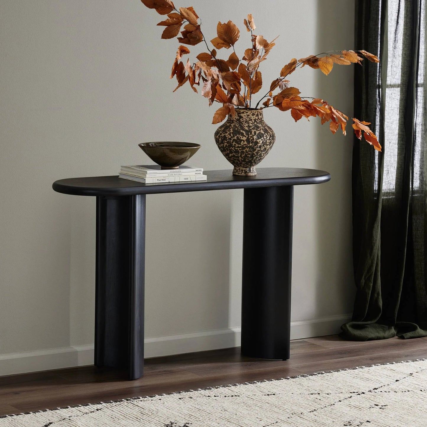027 SI-1977666 | Lifestyle | Paden Console Table by Four Hands. Made from solid acacia, engineered hardwood in a modern style.