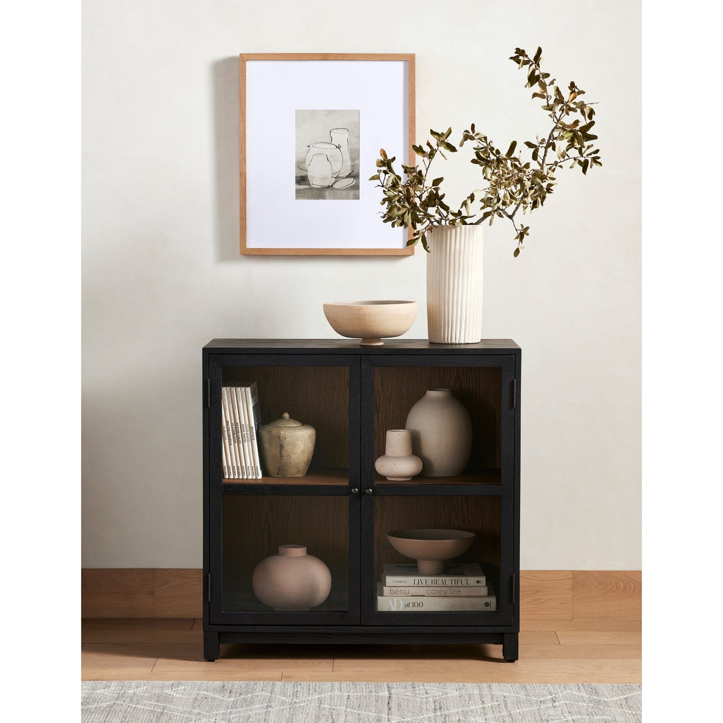 025 SI-1902337 | Lifestyle | Millie Cabinet by Four Hands in matte black, drifted oak. Made from unique in a modern style.