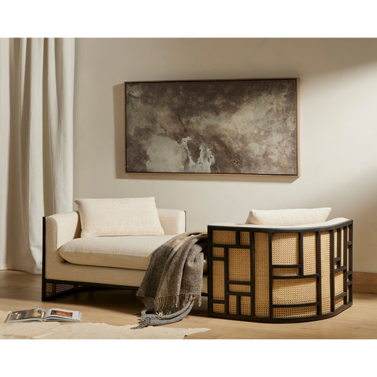 June Chaise by Four Hands in thames cream, brushed ebony, natural cane. Made from 66% polyester, 19% acrylic, 15% flax, linen, solid parawood, cane in a coastal style.