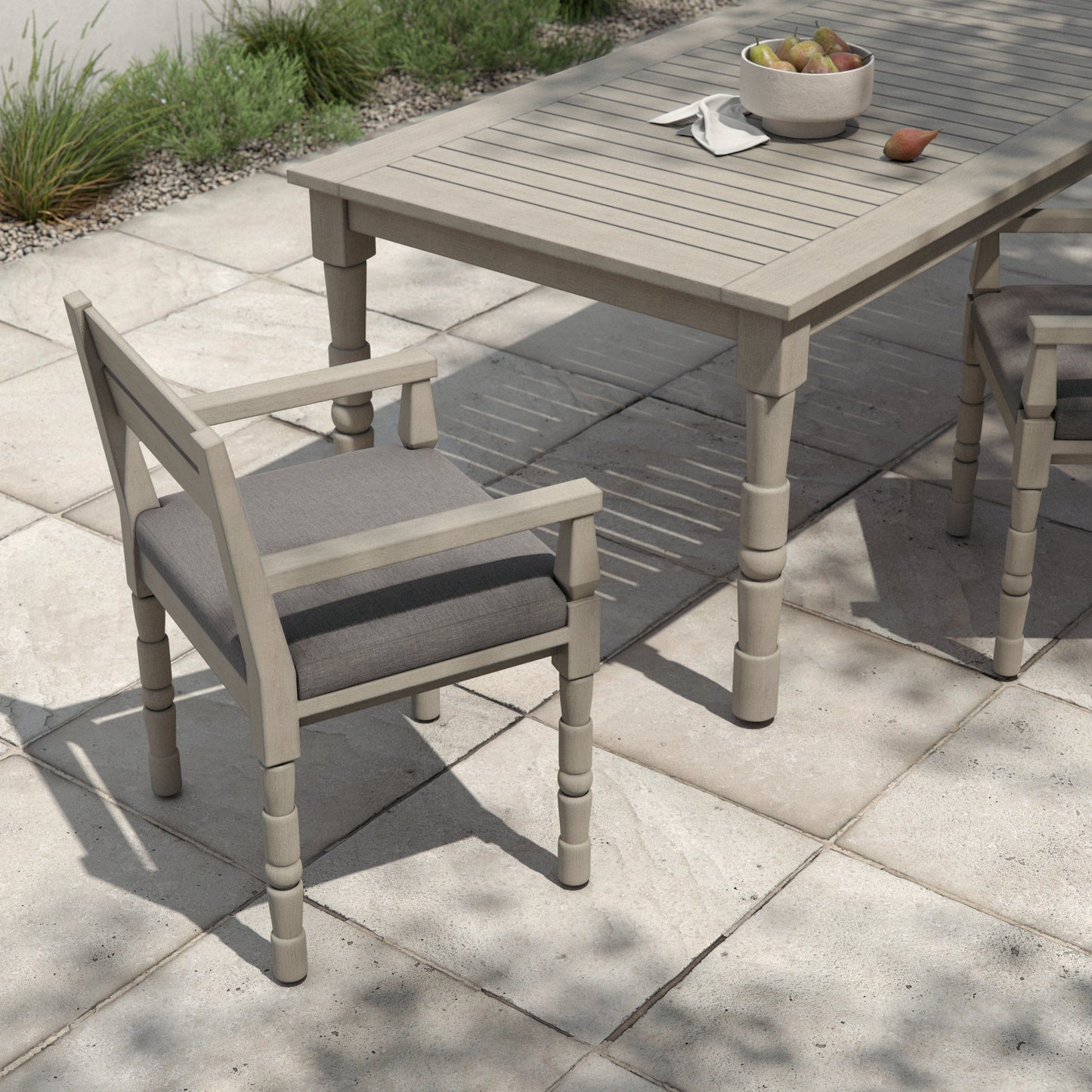 027 SI-1901963 | Lifestyle | Waller Outdoor Dining Armchair, Weathered Grey by Four Hands. Made from 100% olefin, solid fsc®-certified teak, 91% polyurethane foam pad, 9% polyester fiber batting in a transitional style.