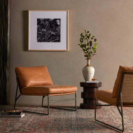 Elias Chair by Four Hands in light natural cane, palermo cognac, gunmetal, dark aged oak. Made from top grain leather, iron, solid oak in a modern style.