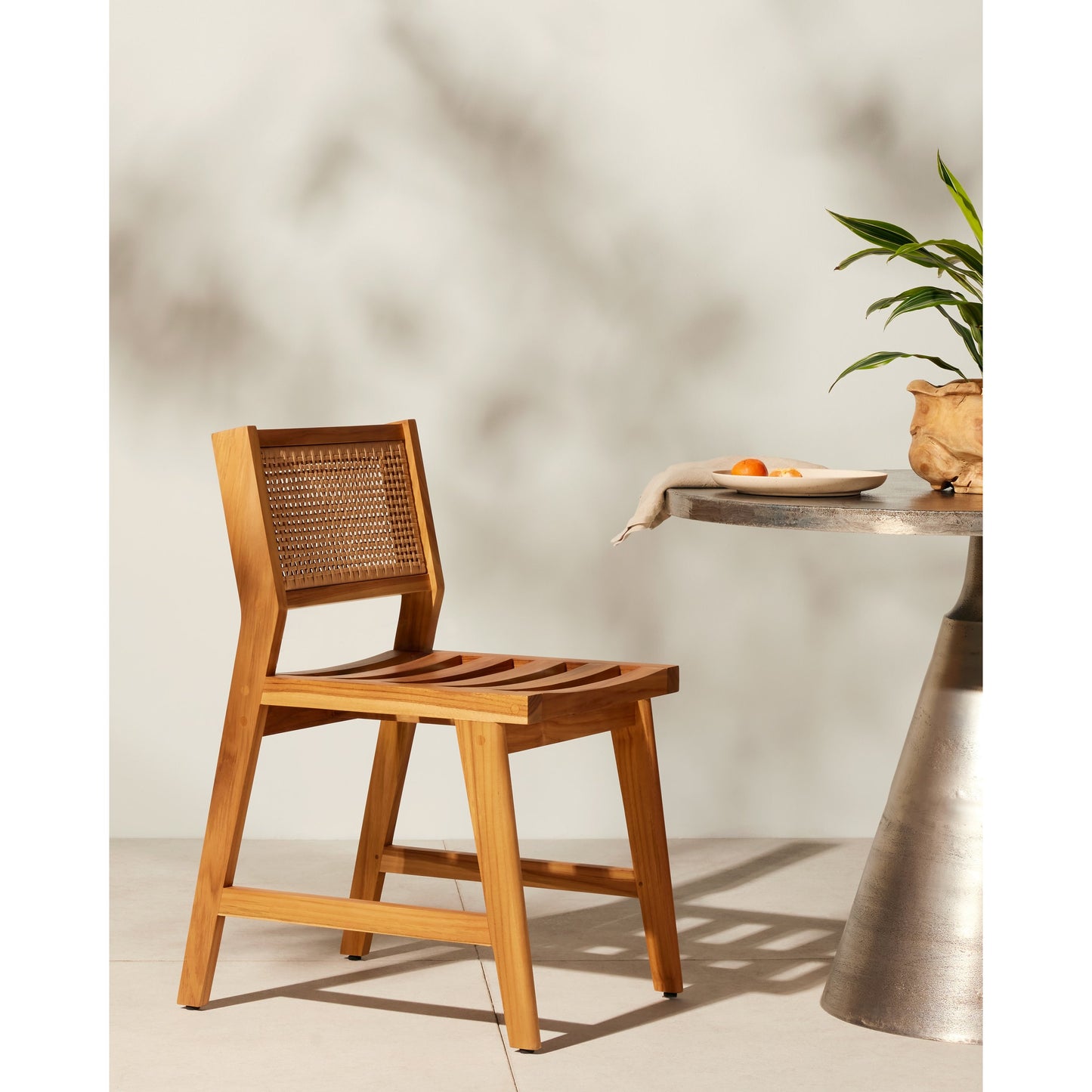 011 SI-1901367 | Lifestyle | Merit Outdoor Dining Chair by Four Hands in faux rattan, natural teak. Made from solid fsc®-certified teak, 100% polyethylene in a transitional style.