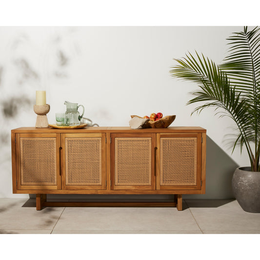 Merit Outdoor Sideboard by Four Hands in faux rattan, natural teak. Made from solid fsc®-certified teak, 100% polyethylene in a coastal style.