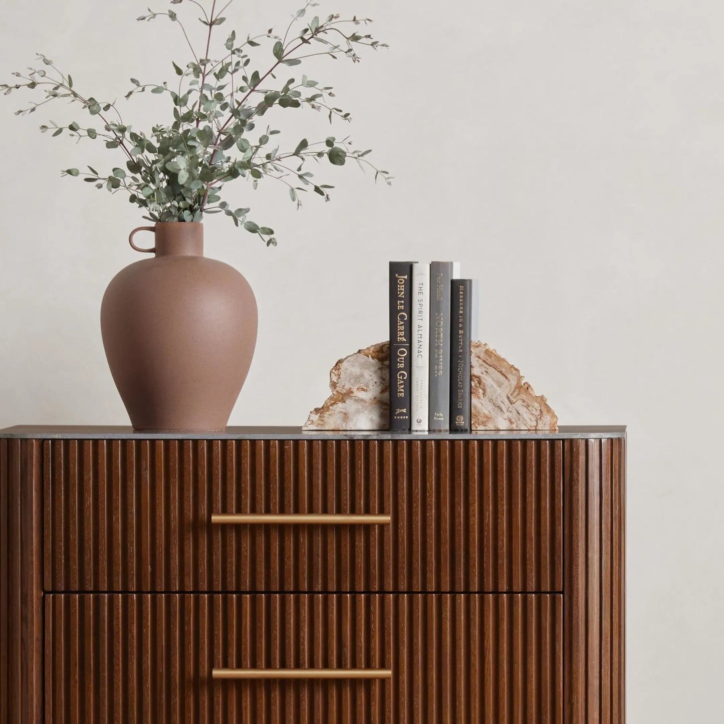 016 SI-1799941 | Lifestyle | Petrified Wood Book Ends by Four Hands in light petrified wood. Made from petrified wood in a coastal style.