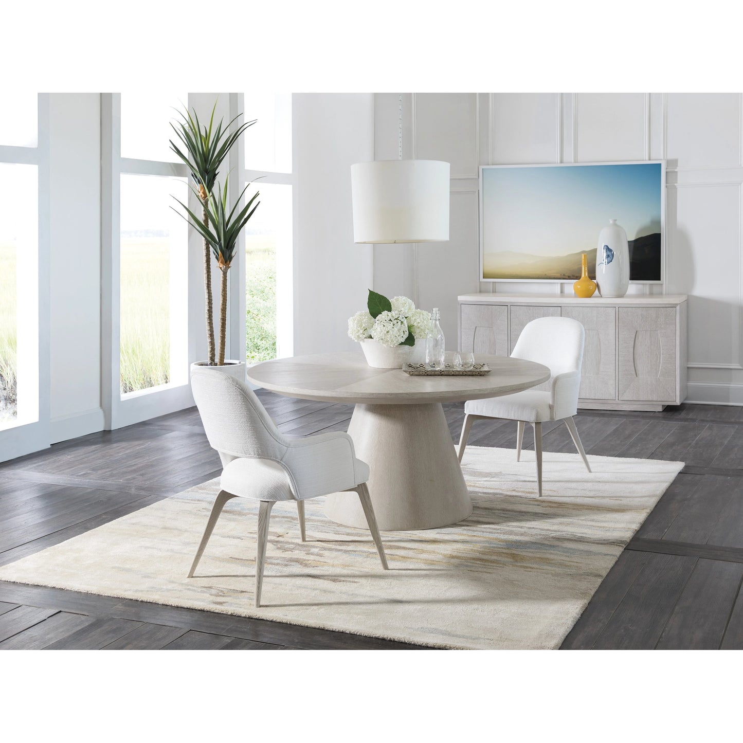 004 SI-1962892 | Lifestyle | Mar Monte Round Dining Table by Artistica Home in champagne taupe. Made from unique in a modern style.