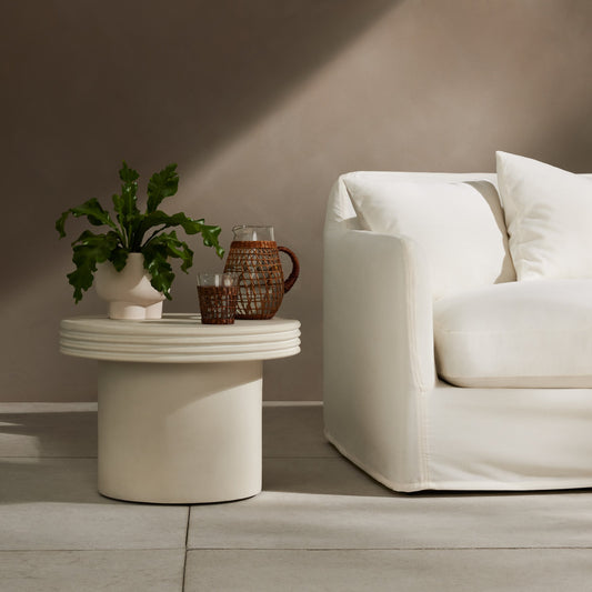 Grecia Outdoor End Table by Four Hands in white. Made from concrete in a modern style.
