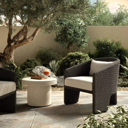 Fae Outdoor Chair by Four Hands in stinson white. Made from 100% olefin, 100% polyethylene, 91% polyurethane foam pad, 9% polyester fiber batting in a modern style.