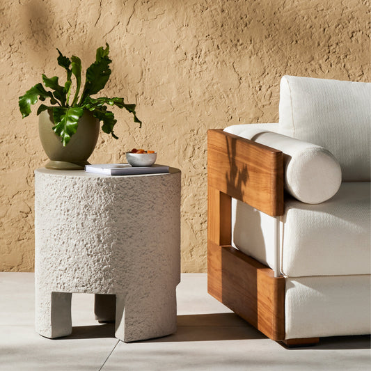 Kember Outdoor End Table by Four Hands in blanc white, matte white. Made from concrete in a modern style.