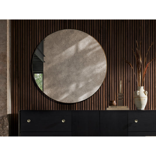 Georgina Mirror Round by Four Hands in polished brass. Made from aluminum, mirror, engineered hardwood in a modern style.