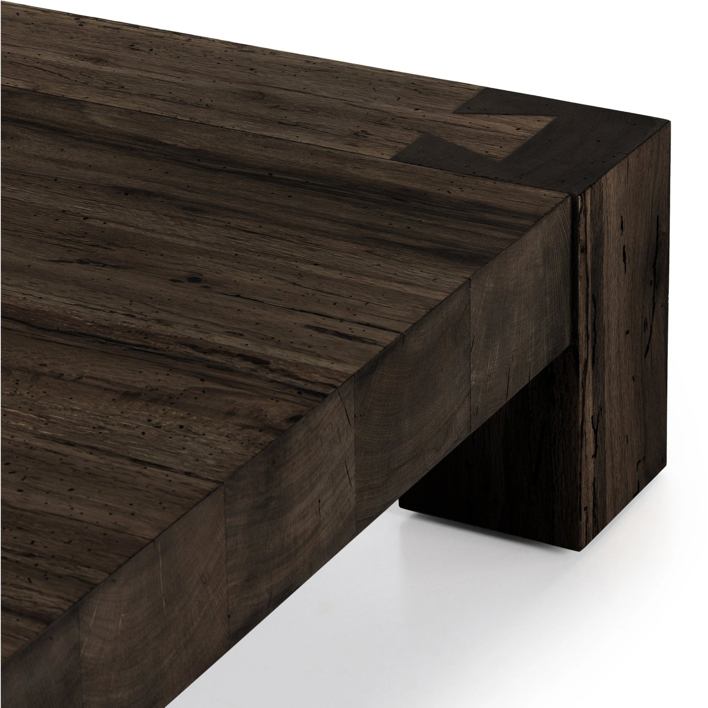007 SI-1976980 | Closeup | Abaso Coffee Table by Four Hands in ebony rustic wormwood oak. Made from thick oak veneer, engineered hardwood in a transitional style.