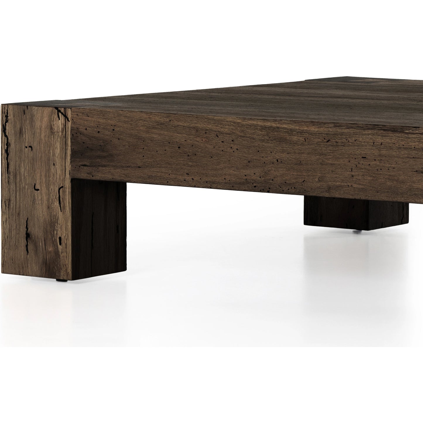 008 SI-1976980 | Closeup | Abaso Coffee Table by Four Hands in ebony rustic wormwood oak. Made from thick oak veneer, engineered hardwood in a transitional style.